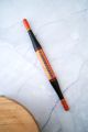 Black and orange roti rolling pin