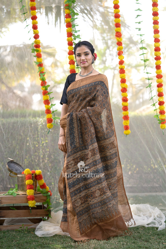Brown ajrakh block print linen silk saree with zari weaving border
