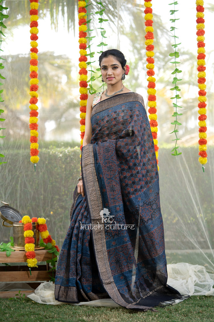 Blue block print linen silk saree with zari weaving border