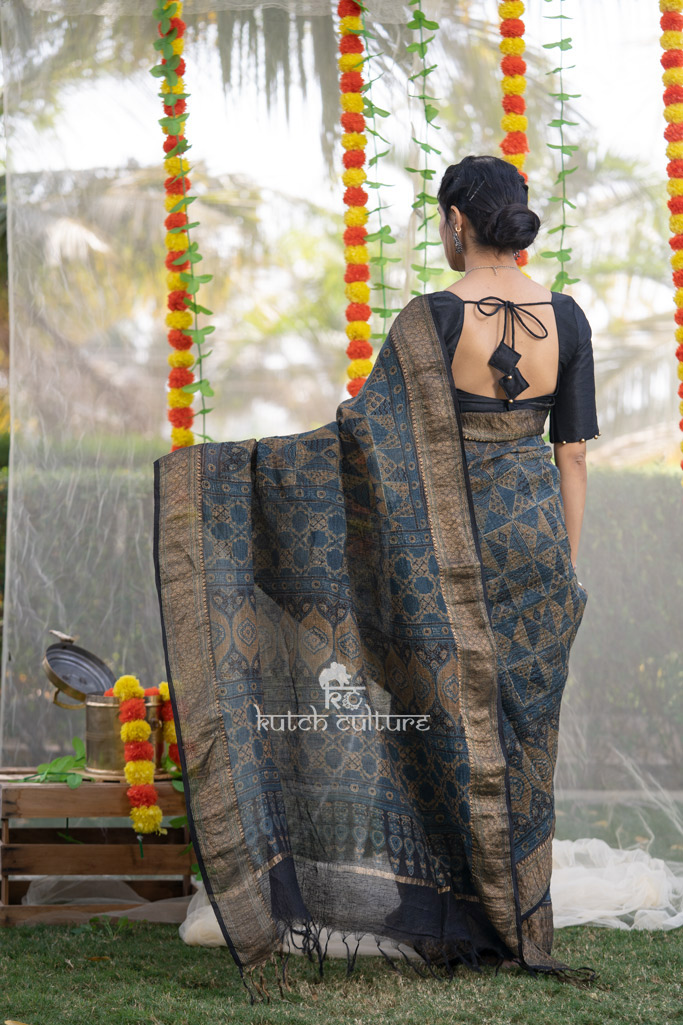 Blue and golden ajrakh linen silk saree with zari weaving border