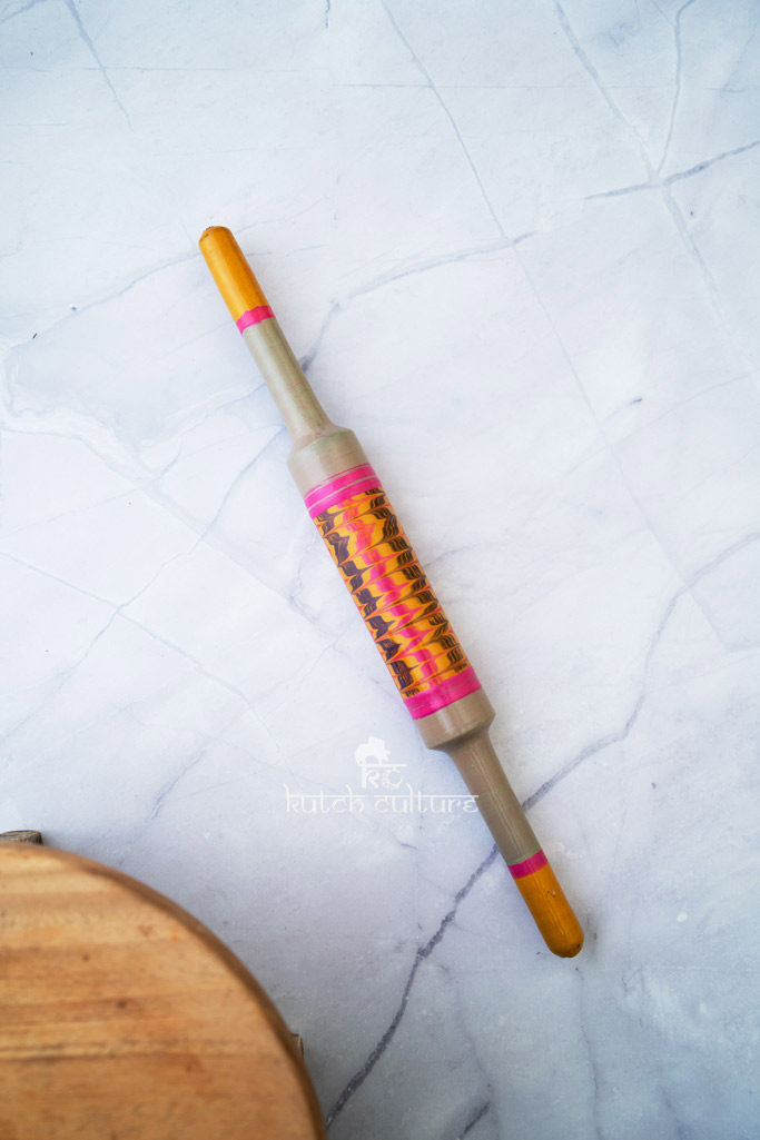 Gray and pink rolling pin