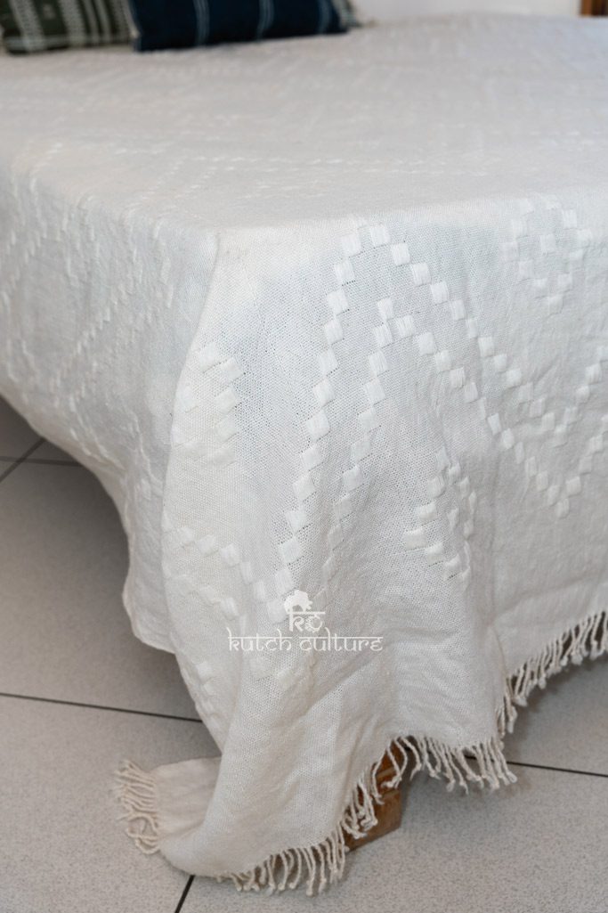Artisan Elegance: Handwoven Bhujodi Wool Bedsheet in Ivory with Hand Embroidery 104*110